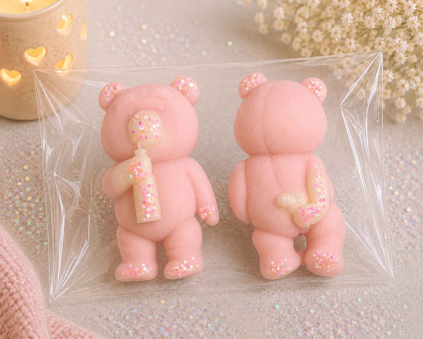 Adorable Newborn Bubbles Baby Bears in pink, holding a bottle, perfect for newborn gifts.